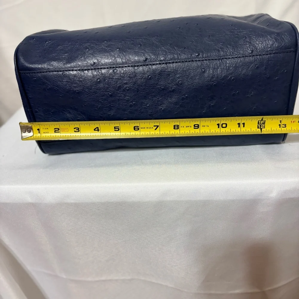 Brooks Brothers navy blue barrel bag satchel made of embossed pebbled leather
